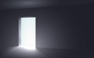 An open space from which appears light in a dark room vector