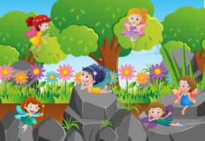 Fairies flying in the park vector