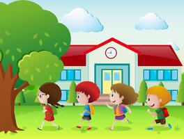 Four kids going to school vector