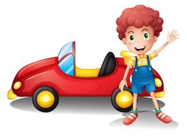 A young boy in front of a red car vector