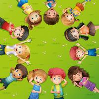 Children lying on grass vector