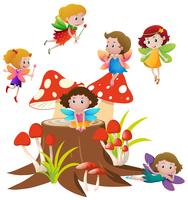 Many fairies flying on mushroom vector