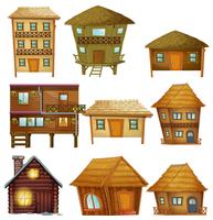 Diferentes diseños de cabañas de madera. vector