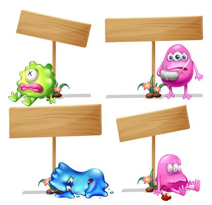 Four wooden signs with cute monsters