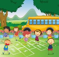 kids and a schoolbus vector