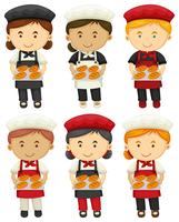 Male and female bakers with baked bread vector