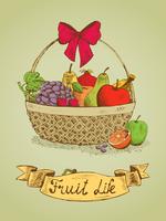 Canasta de regalo fruta de vida con emblema de arco.