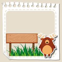 Paper template with deer on grass vector