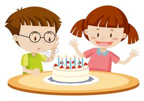Niños soplando pastel en cumpleaños vector