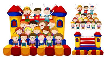 Happy children play in the bouncing house