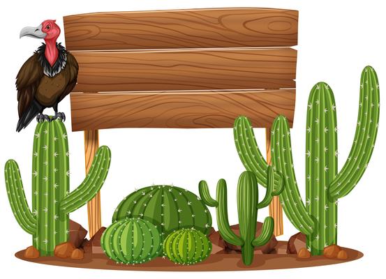 Wooden sign and vulture in cactus garden