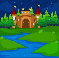 Castle tower in the field at night time vector