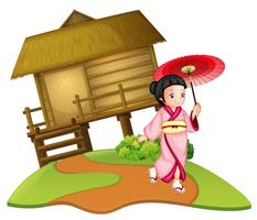 Una chica japonesa en cabaña de madera.
