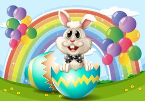 Easter bunny with egg and balloons vector