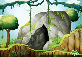 Cave in the deep forest vector