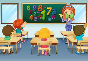 Math teacher teaching in classroom