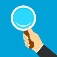 Magnifying icon in a hand vector