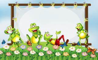 Frame design with green frogs in the garden vector