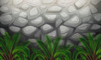 Un muro de piedra con plantas. vector