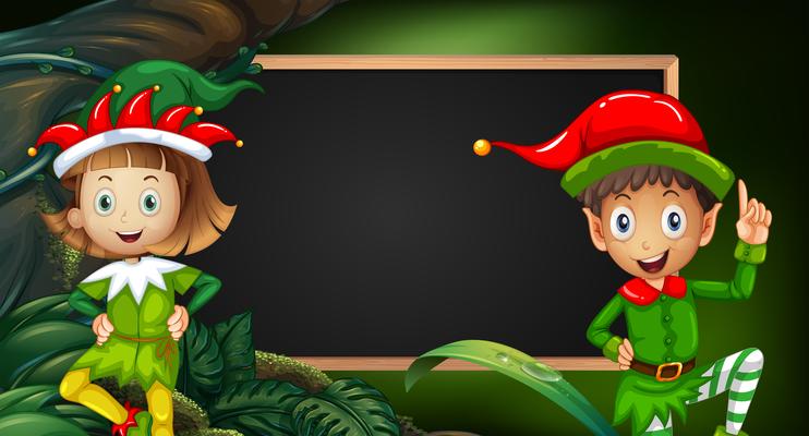 Boy and girl in elf costume by blackboard