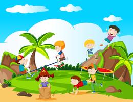 Happy children playing in playground vector