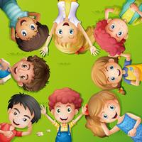 Lots of children lying on grass vector