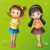 Dos chicas recostadas sobre la hierba verde vector