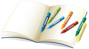 Blank book and many crayons vector