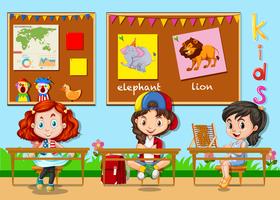Children studying in the classroom vector