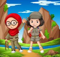 Two girls hiking up the mountain vector