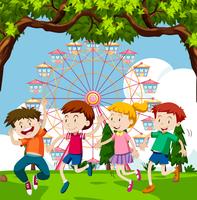 Happy children playing in park with ferris wheel in background vector