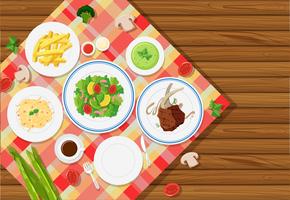 Background template with food on tablecloth vector