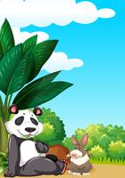 Panda and rabbit in garden vector