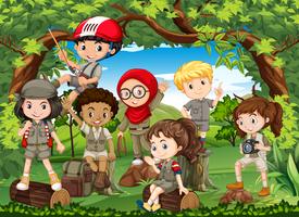Many children hiking in the forest vector