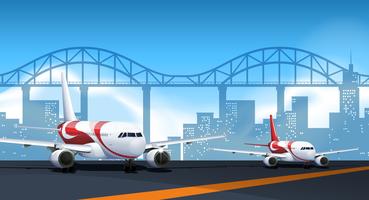 Two airplanes parking on runway vector