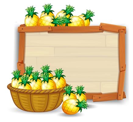 Pineapple on wooden board