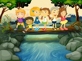 Children having fun by the river vector
