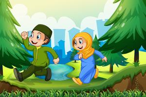 Muslim boy and girl in the park vector