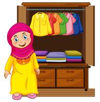 A muslim girl in front of closet