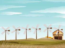 Farm scene with windmill and barn vector