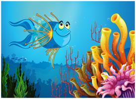 A blue fish under the sea near the coral reefs vector