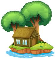 Una casa y un árbol en una isla. vector