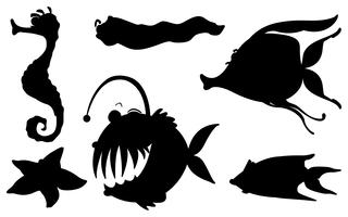 Sea creatures in its silhouette forms vector