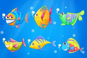 Colorful and smiling fishes under the sea vector