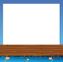 An empty paper template with a wooden bridge and fishes at the bottom vector