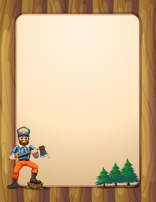 An empty wooden frame with a lumberjack holding an axe across the pine trees