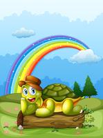 A happy turtle above the log and the rainbow in the sky vector