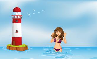Una chica en bikini en la playa al lado de una torre. vector