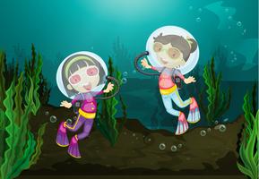 Happy girls diving underwater vector