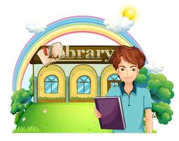 A boy holding a book standing in front of the library vector